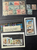 Box of Misc International Stamps, Souvenir Sheets & More - 94 Photos